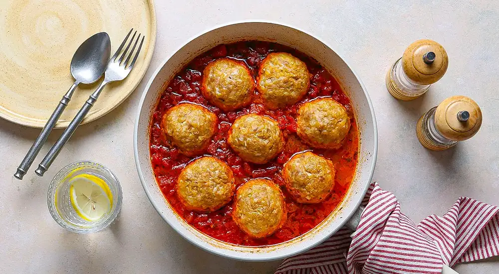 Chicken meatballs with bulgur in a spicy sauce