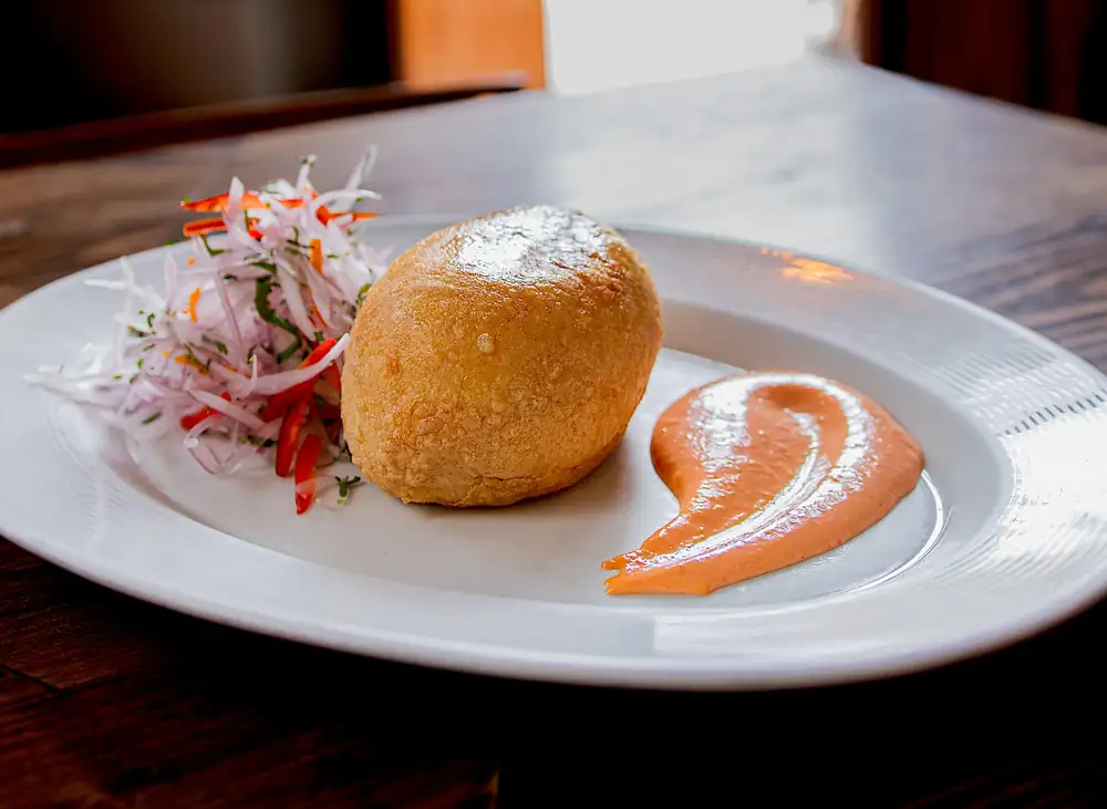 Stuffed potato. José del Castillo in Isolina