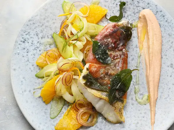 Saltimbocca of pike-perch on orange and fennel salad with harissa yogurt