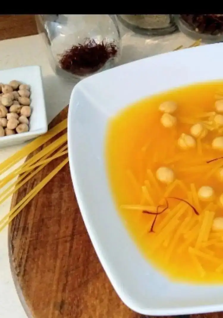 Chicken soup with chickpeas and saffron