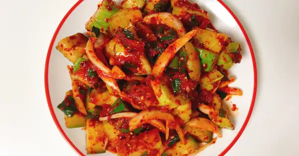Making spicy and crunchy cucumber salad—just looking at it makes my mouth water :)