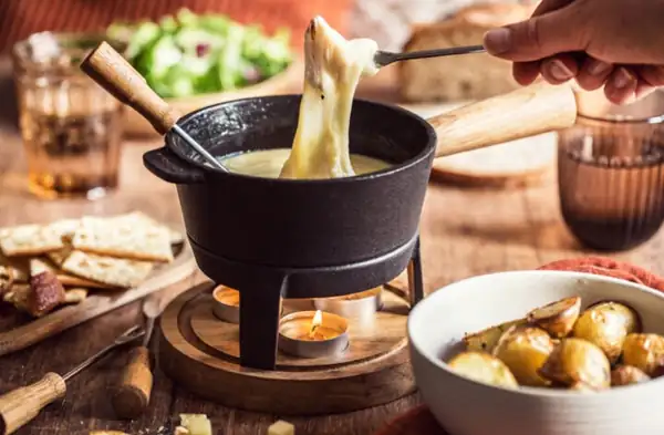 Homemade Savoyard fondue (Comté, Beaufort, Emmental cheeses)