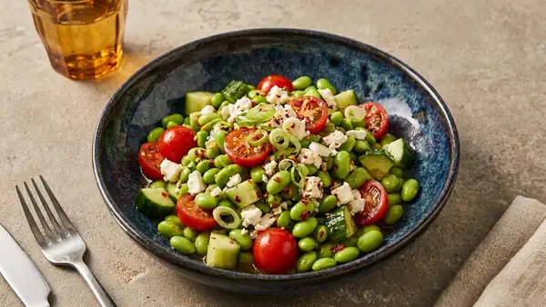 Crisp edamame and cucumber salad with feta and tomatoes