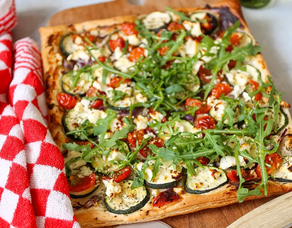 Summer sheet tart with courgette and feta