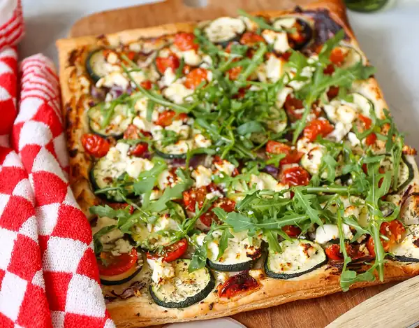 Summer sheet tart with courgette and feta