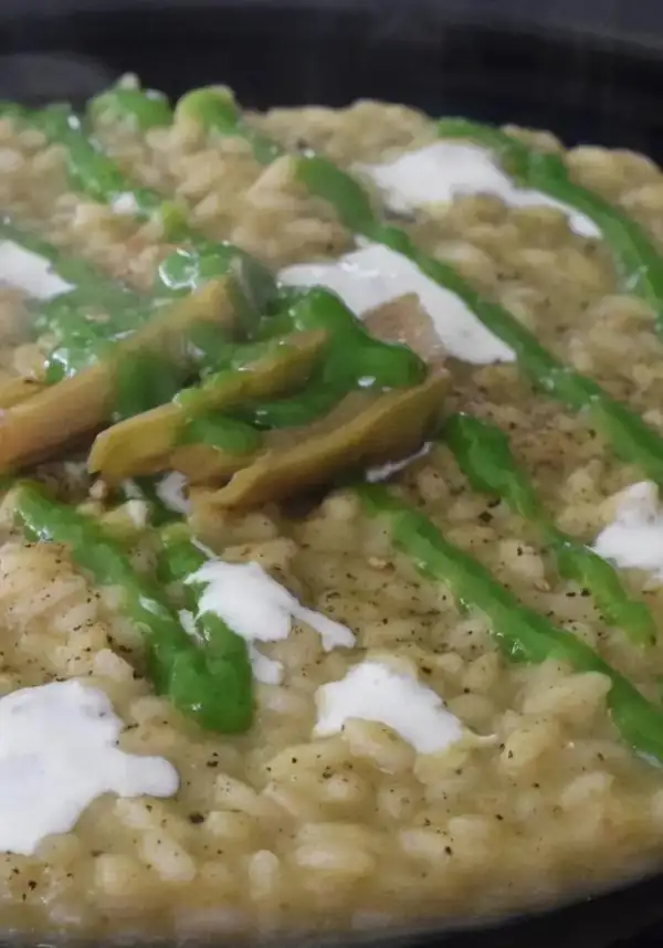 Risotto with artichoke stems and leaves, cream of turnip tops and burrata
