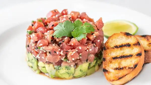 You Should Be Topping Your Tuna With This Powder Usually Reserved For Desserts