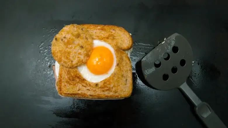 Egg-In-A-Hole Grilled Cheese Is The Upgrade Your Sandwich Deserves