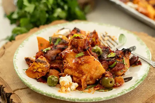 Honey Harissa Sheet Pan Chicken with Sweet Potatoes, Feta, and Olives
