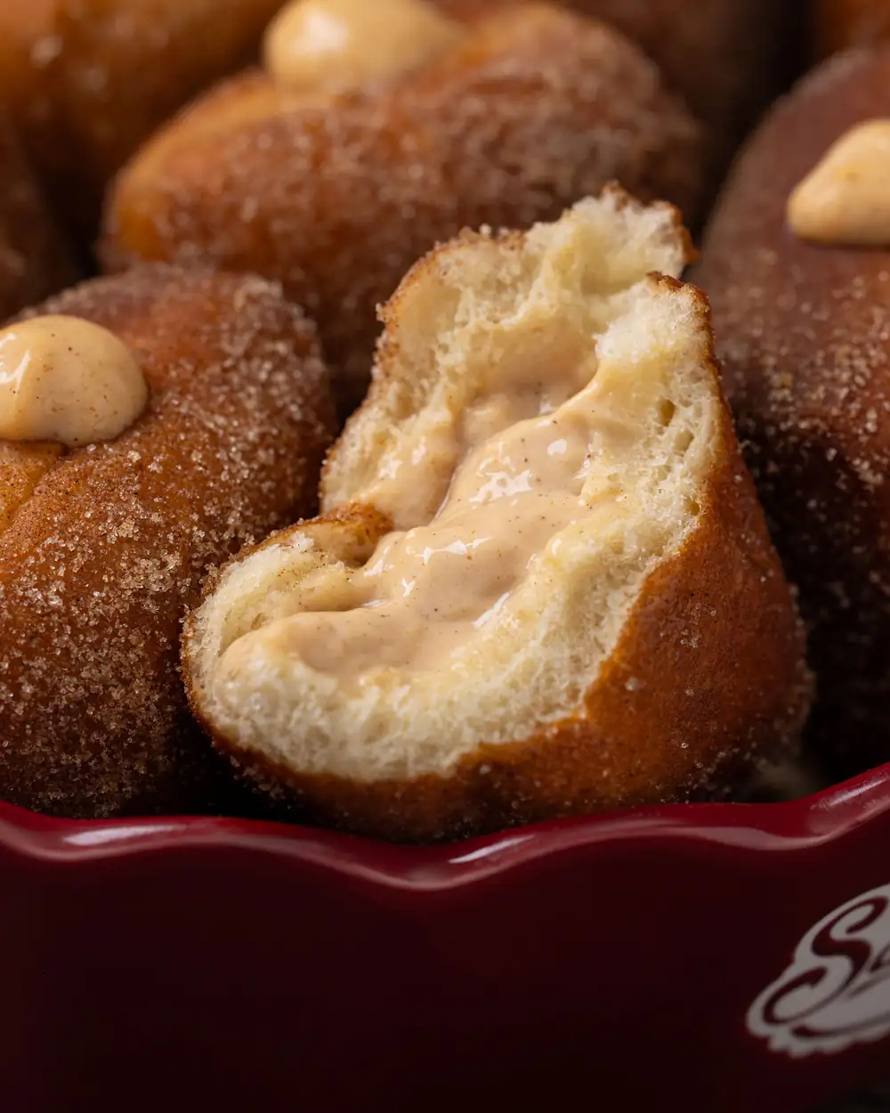 Caramel pillows with cinnamon pudding / filled yeast pillows
