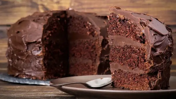 The Key Ingredient Difference In Devil's Food Cake Vs. Chocolate Cake