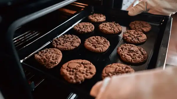Here's Why You Should Never Scoop Cookies Onto A Hot Baking Sheet