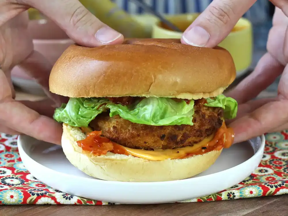 Korean-style breaded chicken burger: crispy, spicy, and ultra tasty