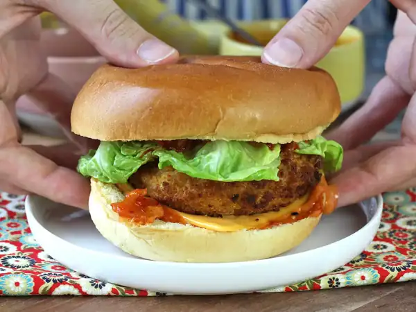 Korean-style breaded chicken burger: crispy, spicy, and ultra tasty