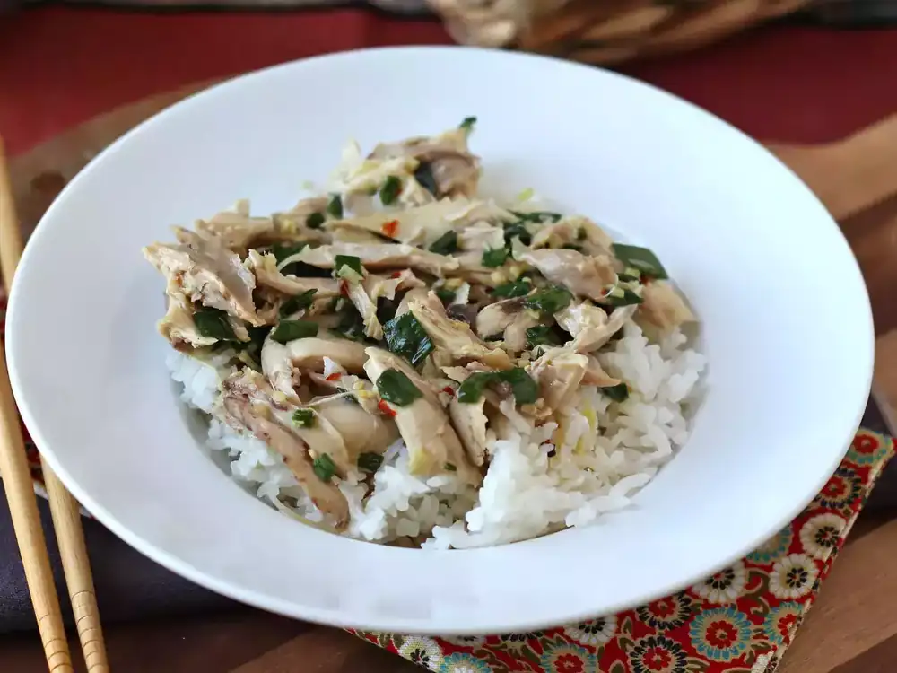Steamed Chinese chicken with ginger and spring onion, tender and juicy