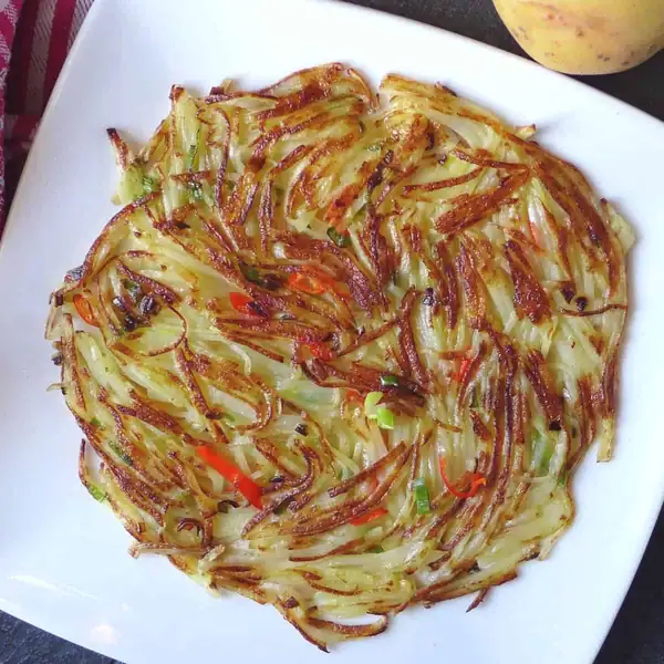 Spicy Chinese potato pancake (干煸洋芋丝)