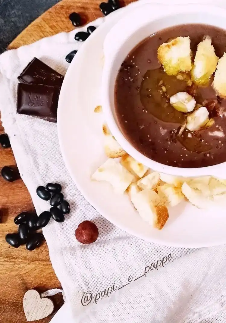 Black bean soup with dark chocolate and hazelnuts
