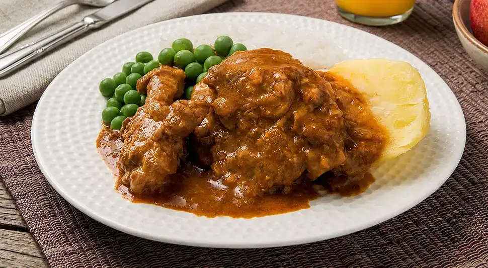 Delicious turkey stew with chicha de jora