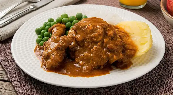 Delicious turkey stew with chicha de jora