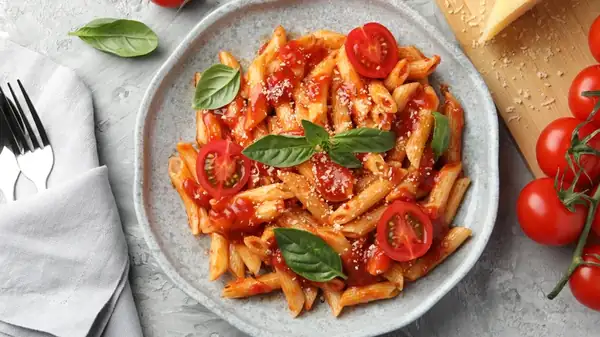 The Simpler Way To Dress Pasta Without Making A Full Tomato Sauce