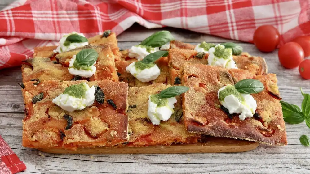 Tomato schiacciata: the yeast-free recipe for a crispy outside and soft inside