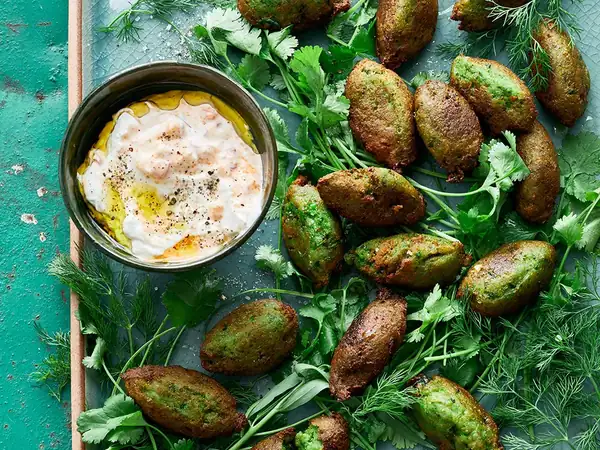Pea and herb falafel with paprika and pepper yogurt