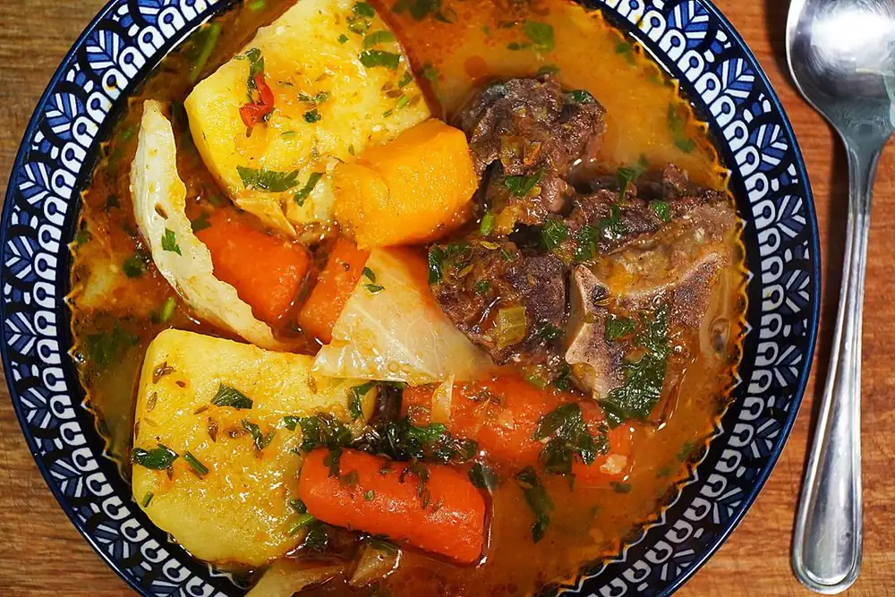 Comforting Caribbean Beef Bone Soup with Root Vegetables