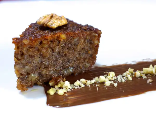 Sumptuous Walnut Syrup Cake Covered with Chocolate Ganache