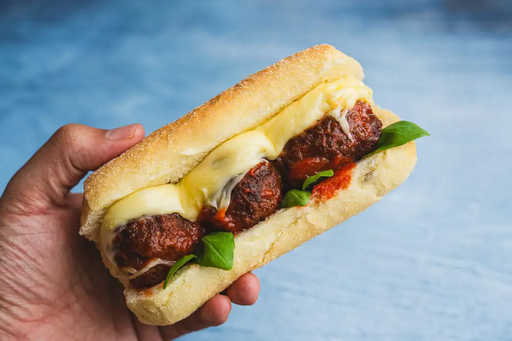 Sandwich with 'nduja meatballs in tomato sauce
