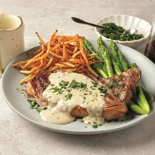 Beef sirloin steaks with blue cheese sauce