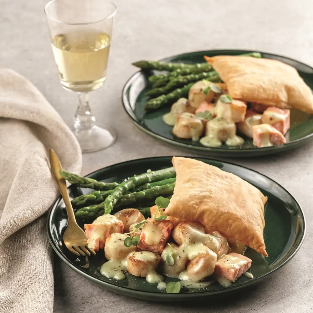 Deconstructed puff pastries with salmon and scallops
