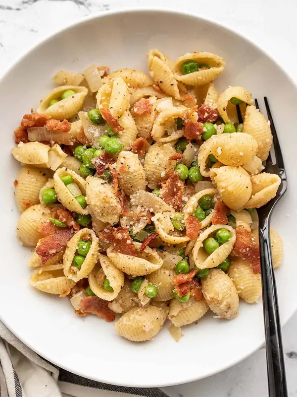 Use up pantry staples with this easy Pasta with Bacon and Peas!