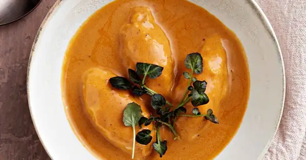 Pike quenelles and crab sauce