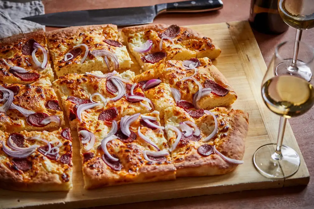 Cheese and sour cream bread flambé