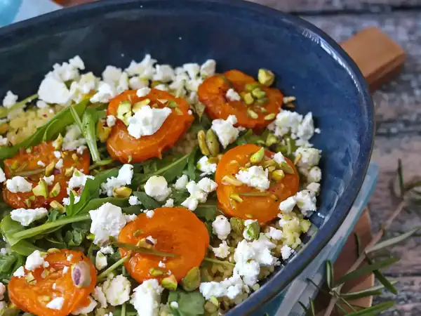 Pearl couscous salad with roasted apricots, feta and arugula