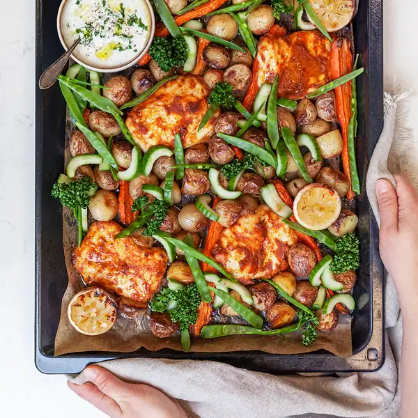Tandoori halloumi and roasted potatoes on a plate