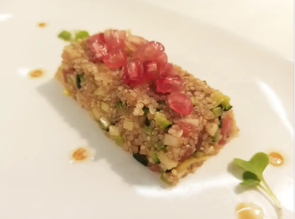 Red quinoa salad with leeks and pomegranate