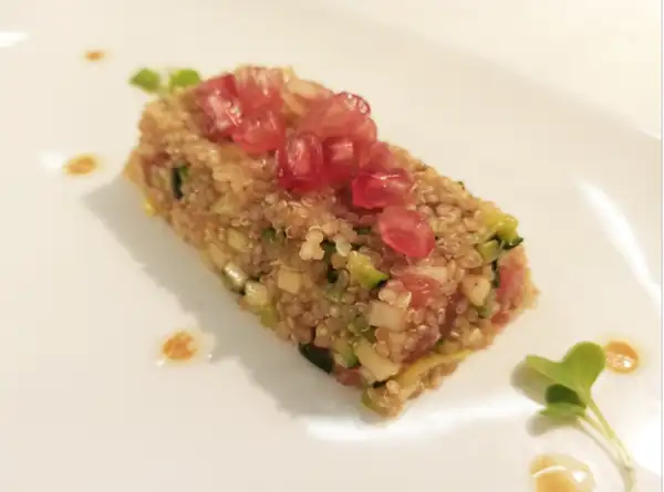 Red quinoa salad with leeks and pomegranate