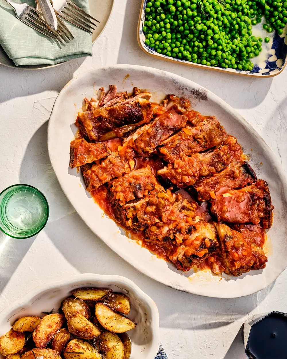 Receta de panceta de cordero estofada con limón, harissa y vino blanco