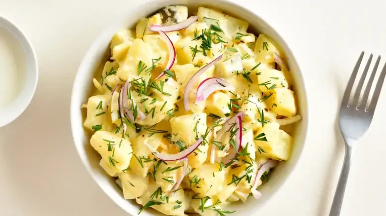 The Creamy Addition Your Potato Salad Needs Will Pack A Major Texture (And Protein) Boost