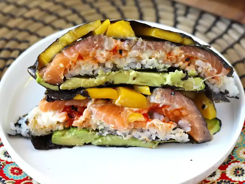 Sushi sandwich with salmon, avocado and mango: fresh, original and very appetizing