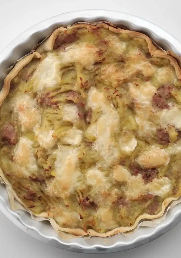 Savory pie with sausage, potatoes and scamorza cheese