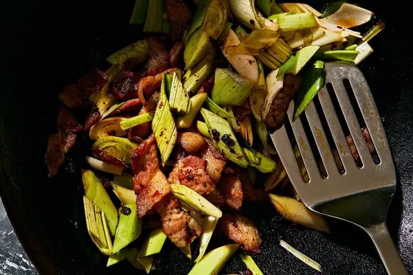 Leeks. Bacon. Wok
