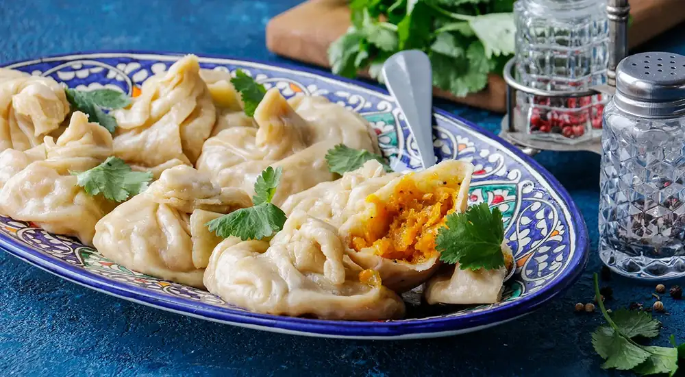 Manti con cebolla y calabaza