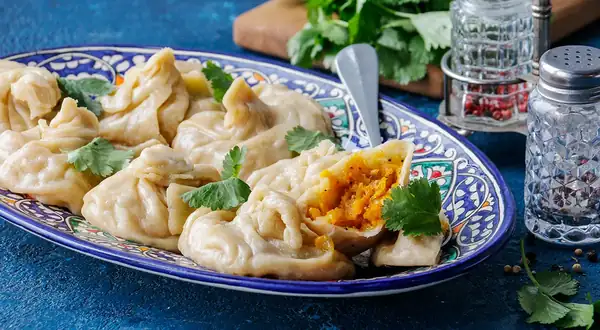 Manti with onions and pumpkin