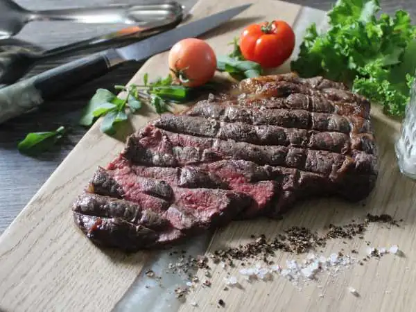 Grilled ribeye steak on the grill