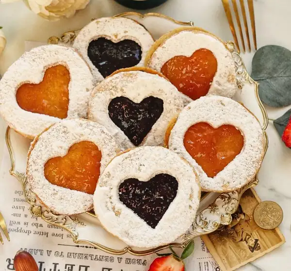 Heart-shaped Linzer Cookies with Jam