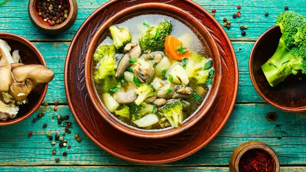 Diet vegetable soup with mushrooms and broccoli