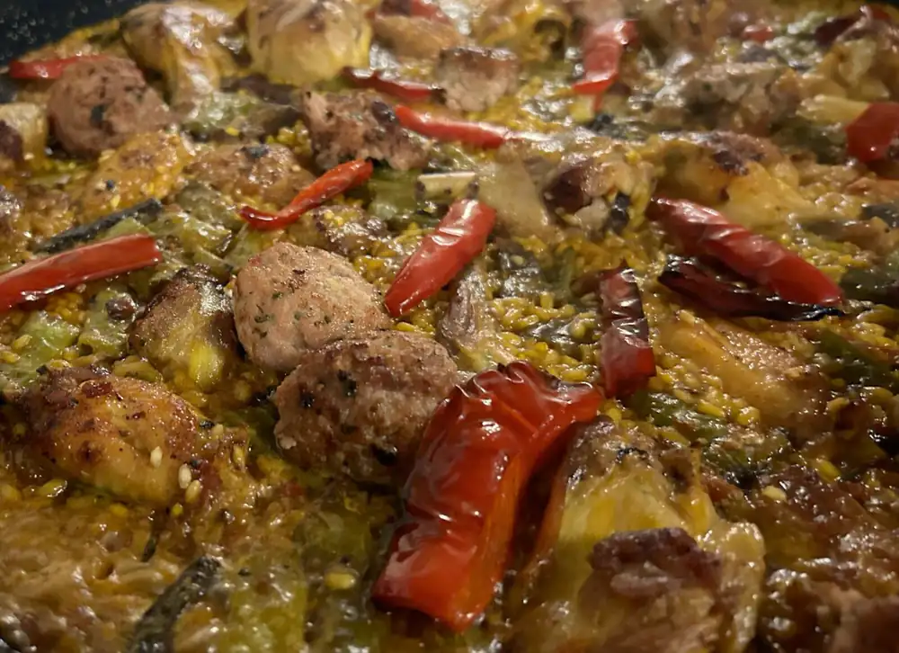Paella with rabbit meat
