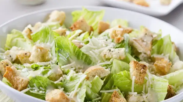 The Original Recipe For Caesar Salad Leaves Out One Salty Ingredient